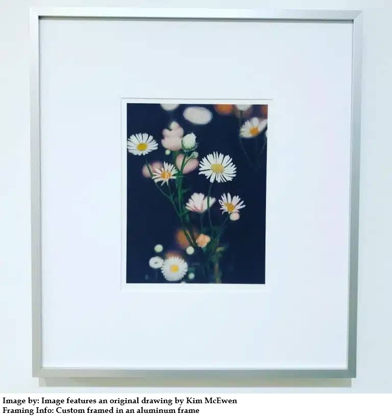 Image features an original drawing by Kim McEwen custom framed in an aluminum frame