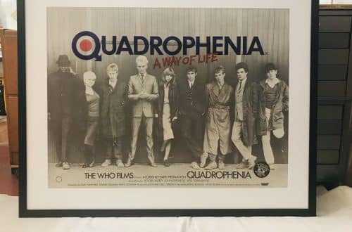Framed black-and-white Quadrophenia poster showing a line of young adults posed together, with 'QUADROPHENIA' and 'A WAY OF LIFE' visible in red/blue text.